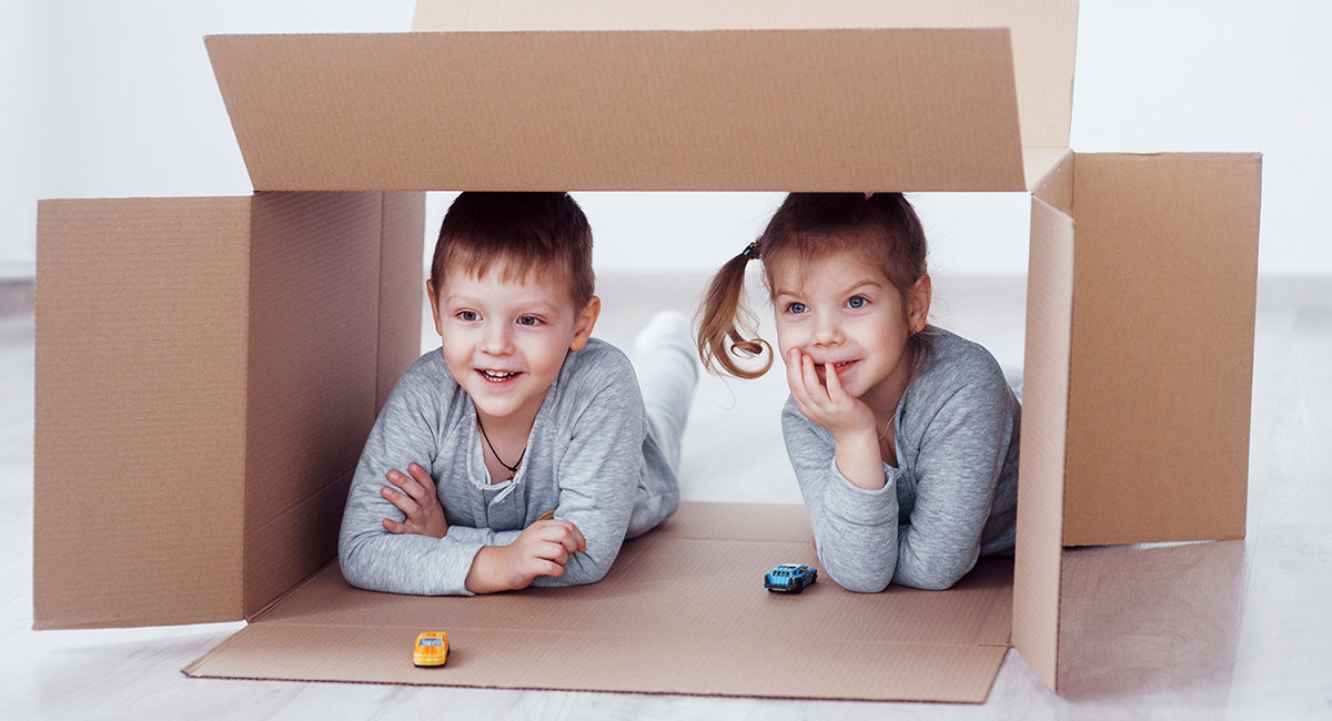keeping kids entertained with cardboard boxes