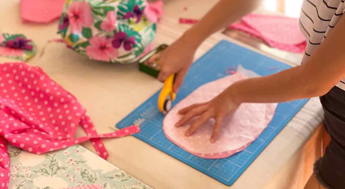 Students Use Template to Sew Scrub Caps