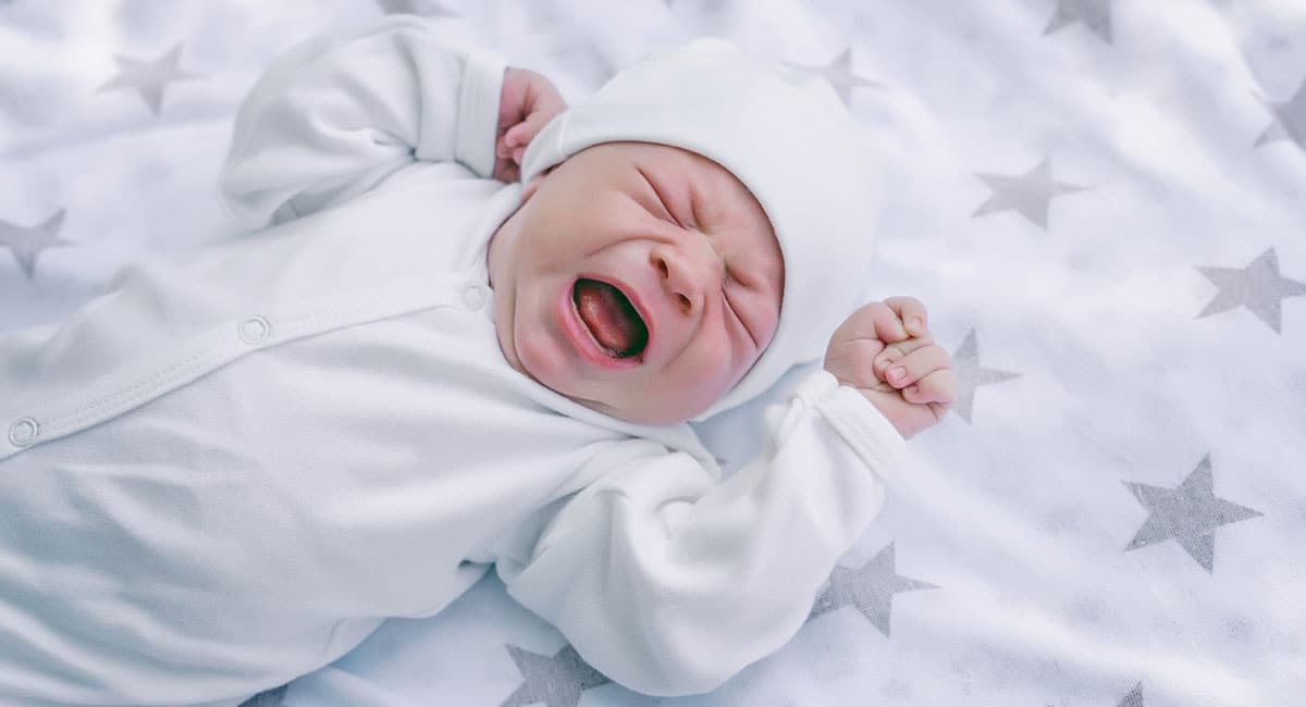 Newborn Baby Crying in Crib