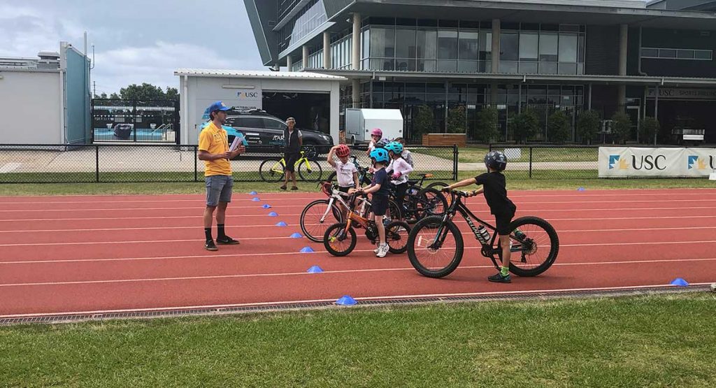 kids learning to ride a bike on the Sunshine Coast