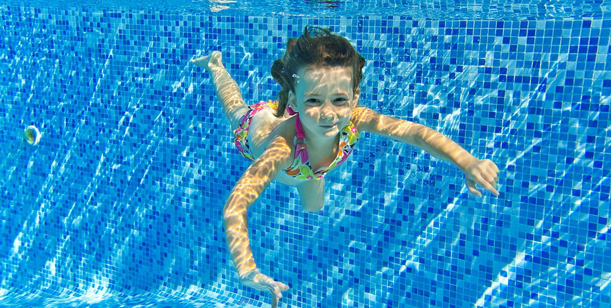 child at swimming lessons