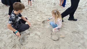 Enjoying Digging at Ipswich Art Gallery Treasure Hunt