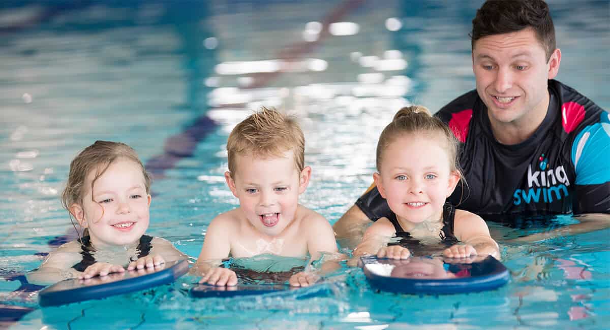 children learning water safety at learn to swim lesson at Kingswim