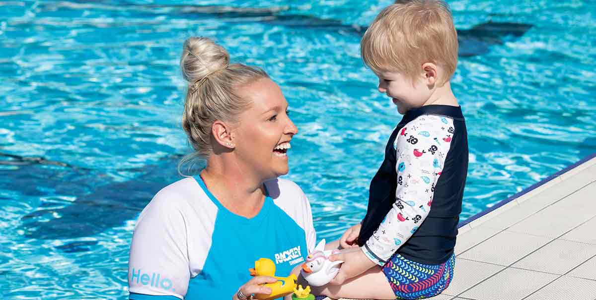 Little Boy in Learn to Swim Class