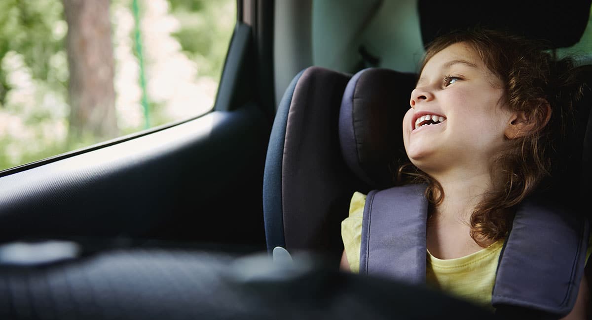 podcasts for kids - child listening in car