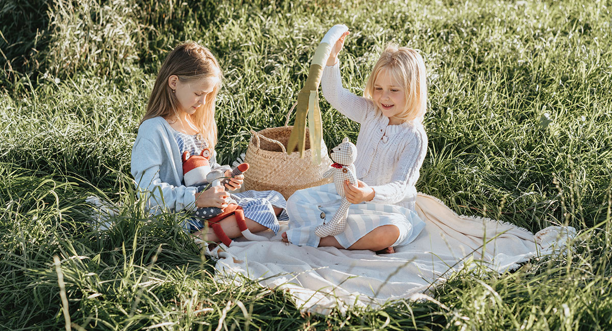 Kids Learning Through Summer with Creative Play on a Picnic Blanket