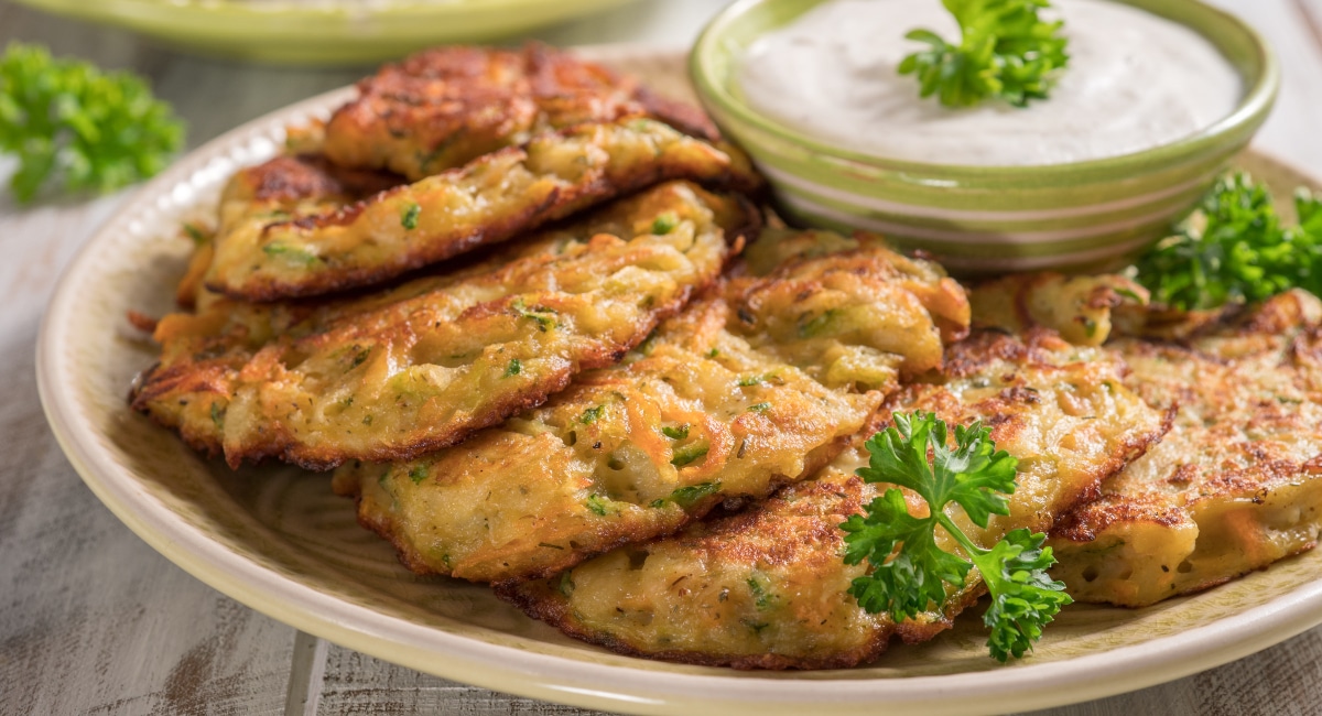 Crispy vegetable fritters with tangy cucumber sauce recipe