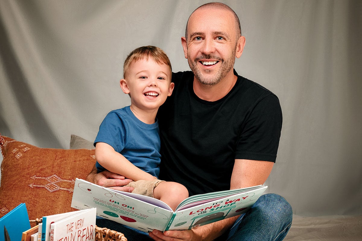Dad reading story with child