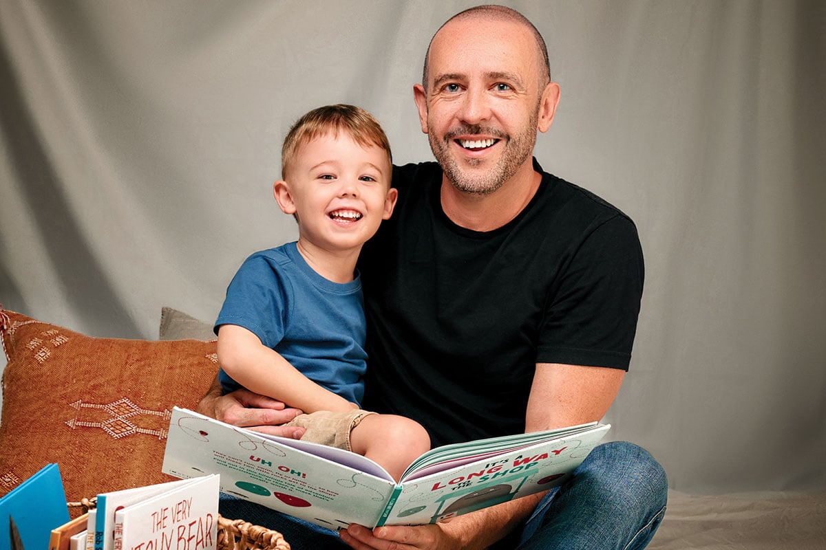 Dad Reading Story with Child