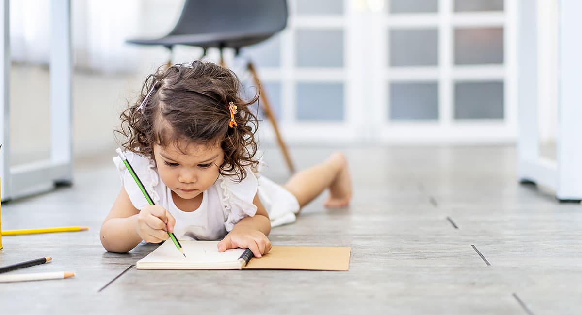 Little Girl Learning to Write