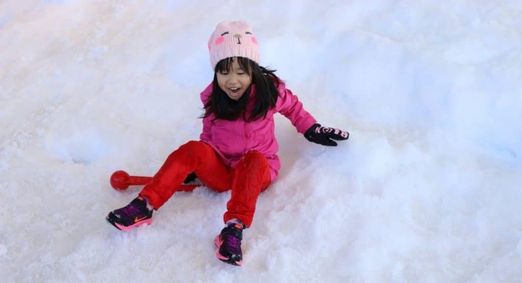 Child in snow at Snow4Kids