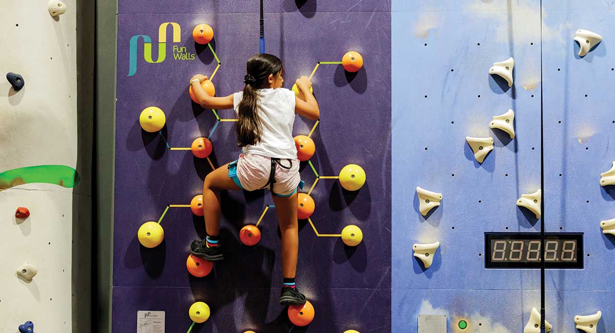 Girl Climbing Wall at Bounce Macgregor