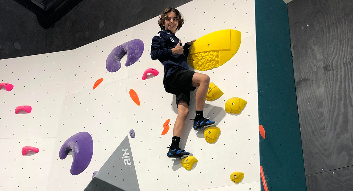 Boy Bouldering at Boulder Heads