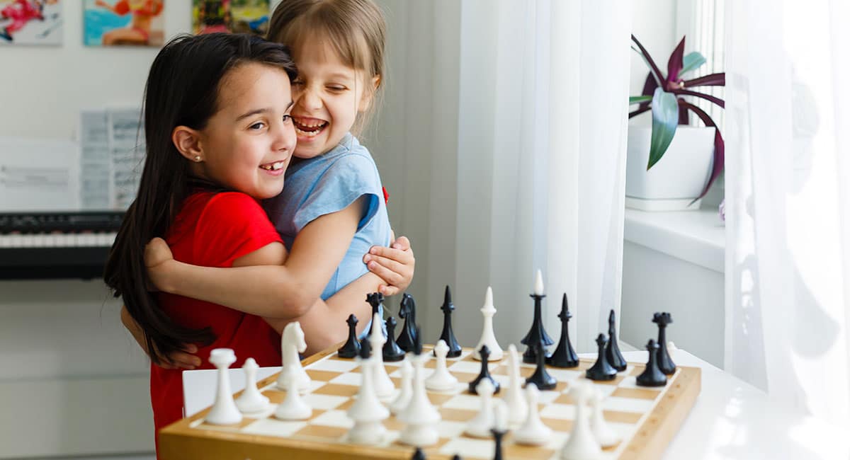 Two Girls Playing Chess