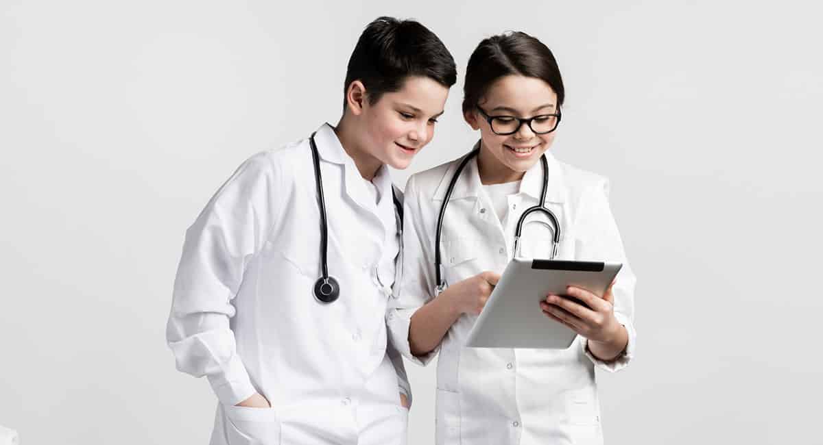 Two Children Dressed Up As Doctors Sunshine Coast Careers Expo