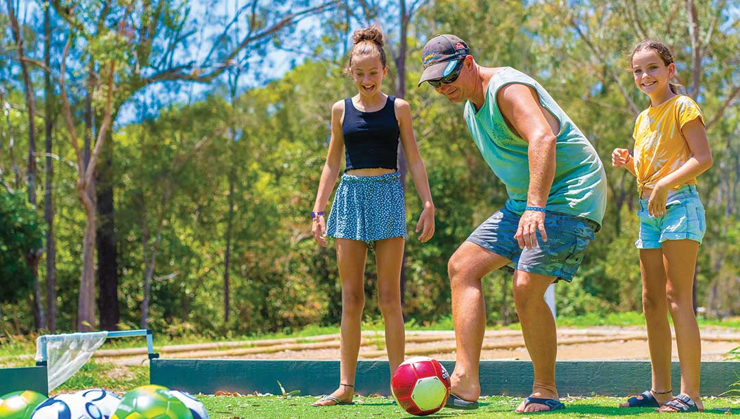 Family Playing Outdoor Foot pool at Big 4 Gold Coast Holiday Park