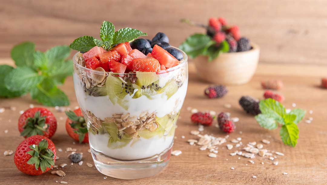 Breakfast Parfait with Granola Yoghurt and Fruit in a Glass an Easy Mother's day breakfast recipe the kids can make