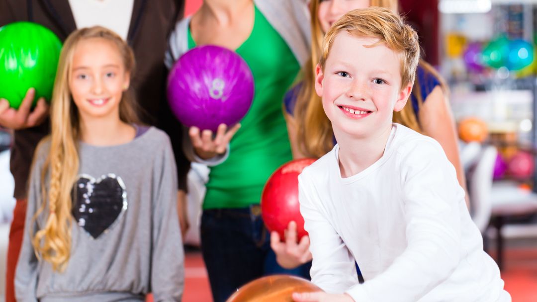 Two Kids Bowling at Suncity Tenpin Sunshine Coast