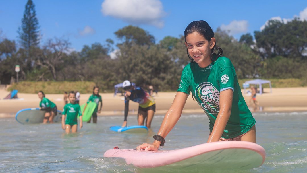 Child Doing Surfgroms at Maroochy Surf School