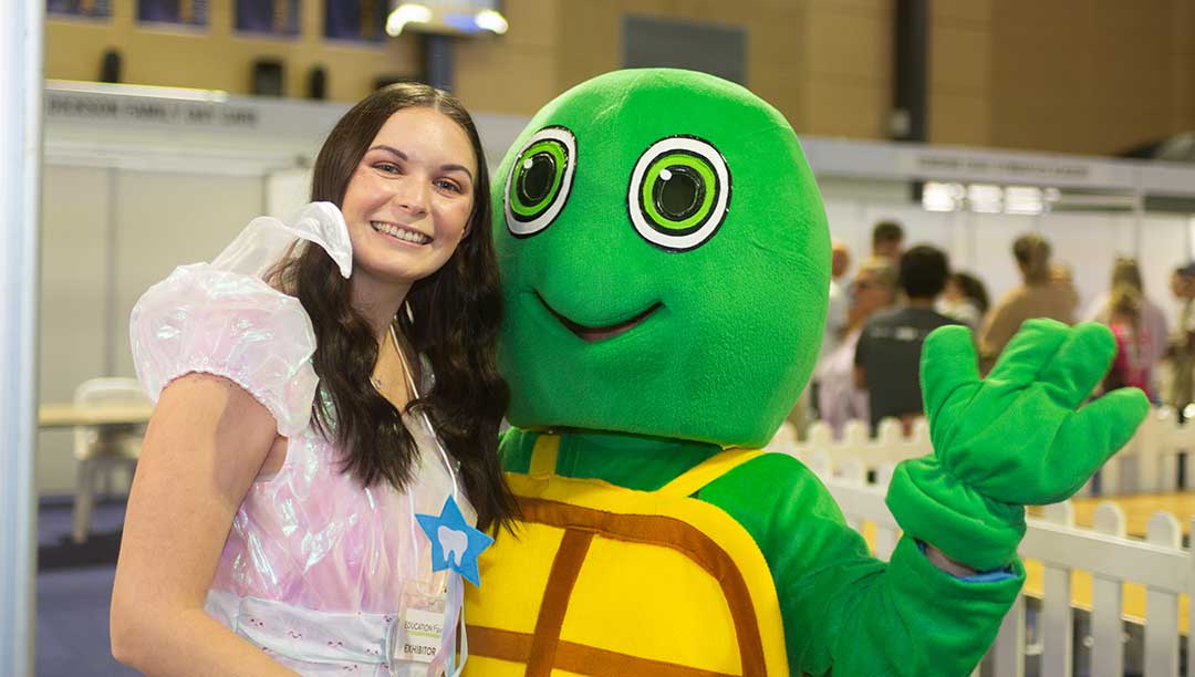 the Tooth Fairy with Trevor the Turtle at the Education Fair 2023