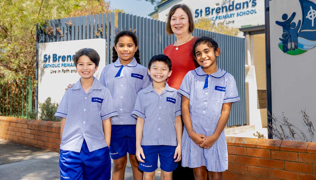 A group of students at the entrance to St Brendan's Primary School Moorooka