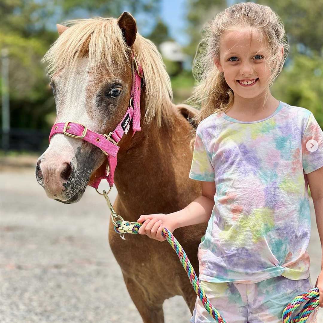Girl Leading Horse at Unity Equestrian Gold Coast Horse Riding Lessons Gold Coast Credit Unity Equestrian