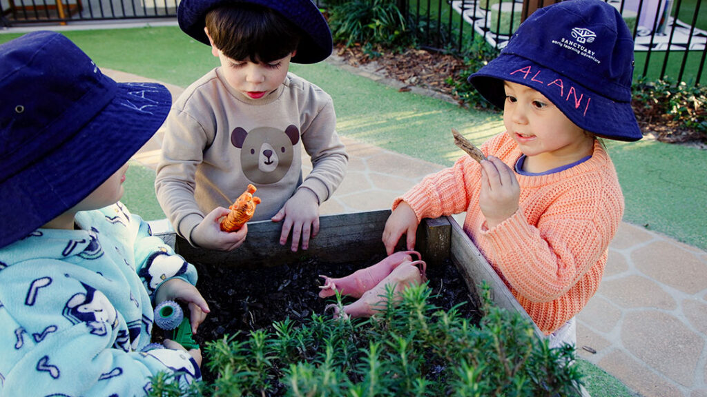 Kids Playing Together in Outdoor Discovery at Sanctuary Early Learning Ashmore
