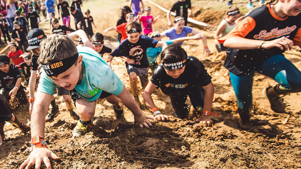 Spartans-race-moreton-bay | Kids in Brisbane, Gold Coast, Sunshine Coast | Kotc Kids Climbing Hill at Spartan Kids Race