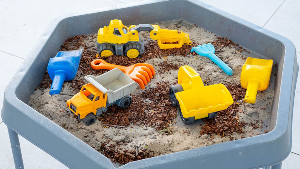 Construction Toys in Sand Set Up for Pretend Play at out & About, Maroochydore Early Learning Centre