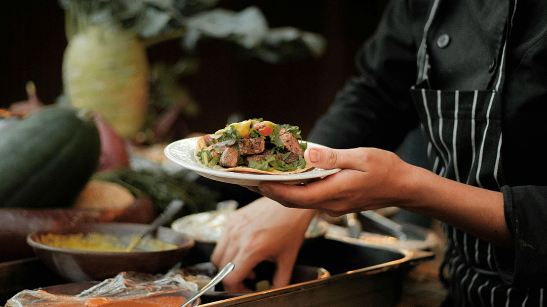 Queensland-chef-pexels | Kids in Brisbane, Gold Coast, Sunshine Coast | Kotc a Professional Chef Plating a Seasonal Dish in an Australian Cafe Kitchen