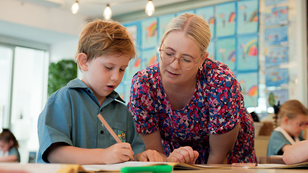 Pacific-lutheran-college_anniversary_primary | Kids in Brisbane, Gold Coast, Sunshine Coast | Kotc Primary Student with Teacher at Pacific Lutheran College, Sunshine Coast