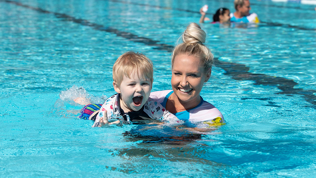 Child Learning to Swim at Rackley Swimming