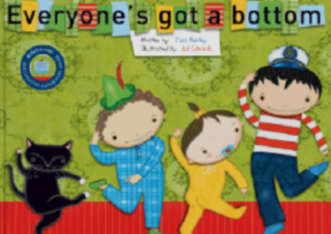 Cover of a Children's book showing three kids dancing on a green background with a black cat; the title 'Everyone's got a bottom' appears in colorful letter tiles.