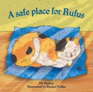 Book Cover Illustration: a Calico Cat Sleeping on a Blue Striped Blanket on a Wooden Floor, with the Title'A safe place for Rufus' and author credits