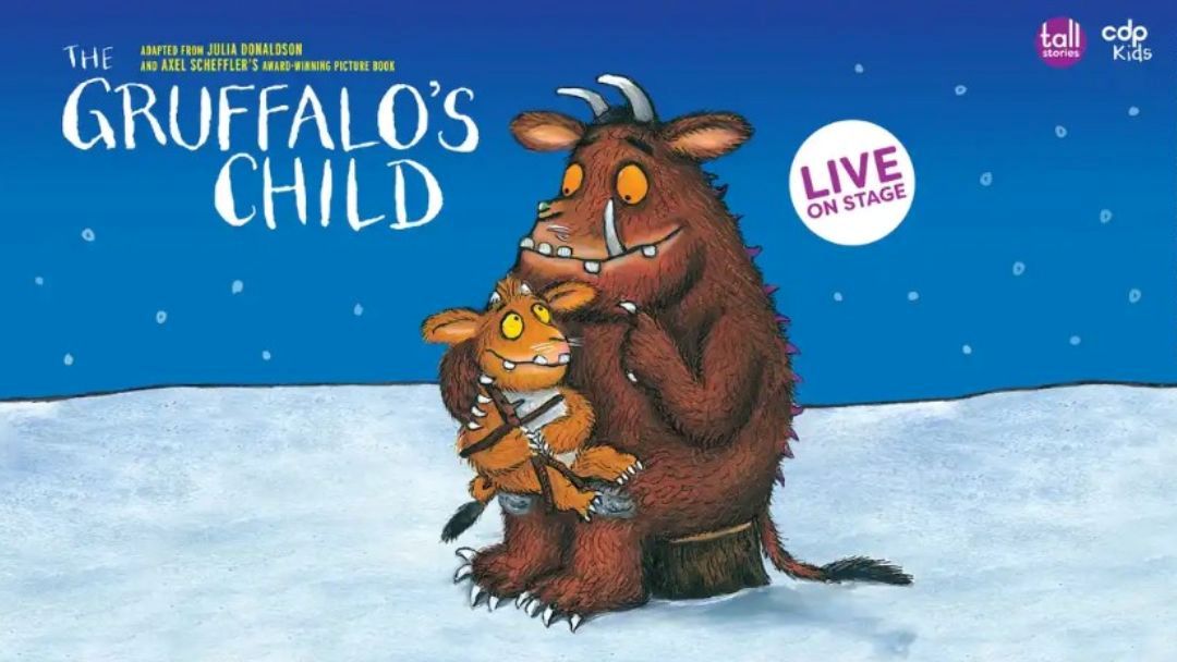 Poster for the Gruffalo's Child Featuring a Tall Brown Gruffalo Holding a Smaller Orange Creature in the Snow with a 'live on Stage' Badge.