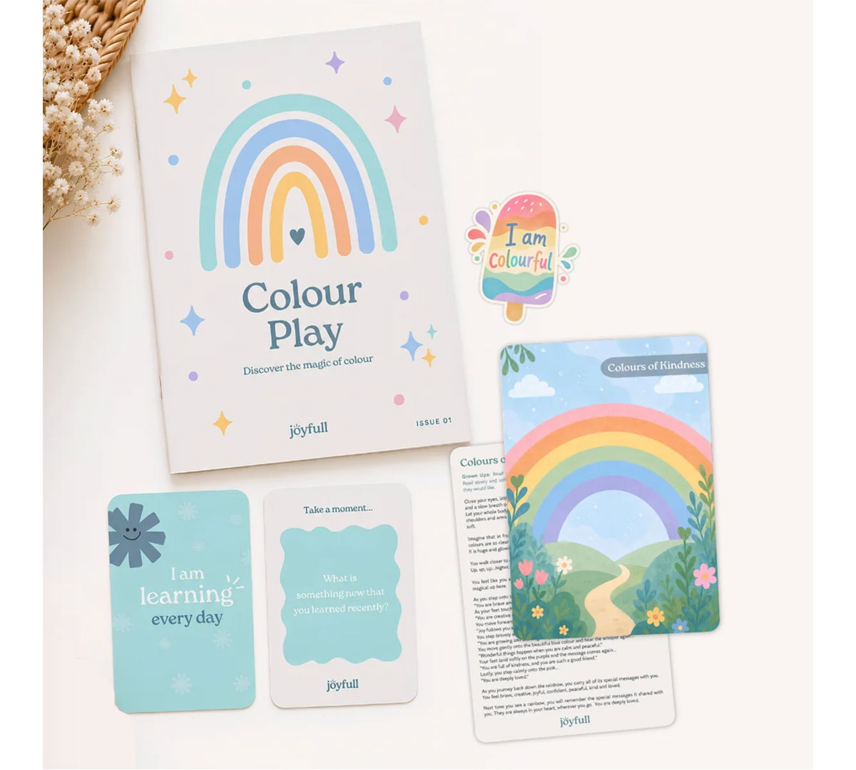 Cto-joyfull | Kids in Brisbane, Gold Coast, Sunshine Coast | Kotc Colorful Rainbow Poster with Learning Cards Arranged on a Pale Surface, Titled'Colour Play' for kids' education.