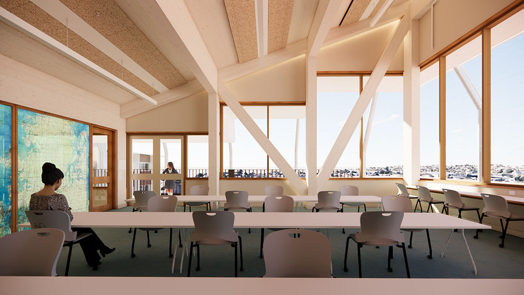 The-canticle---senior-study-hub | Kids in Brisbane, Gold Coast, Sunshine Coast | Kotc Bright Classroom with Long White Tables, Gray Chairs, and Large Windows Offering a City View.