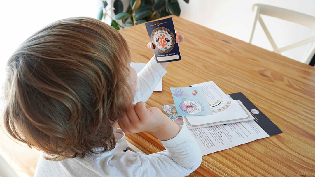 Child Enjoying One of the Stem Challenges in the Ocean Explorers Mail Pack